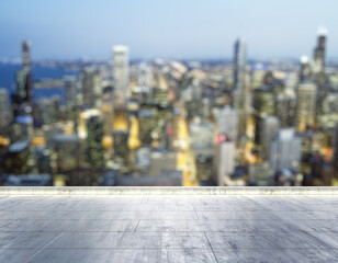 Empty concrete dirty rooftop on the background of a beautiful blurry Chicago city skyline at night, mockup