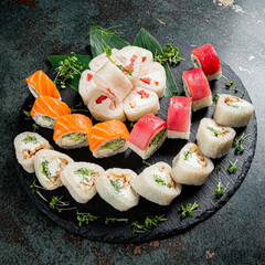 tasty sushi on the black stone