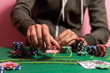 man playing blackjack at the table