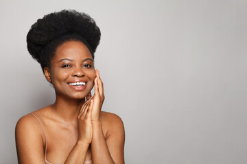 Laughing brunette woman portrait on white background