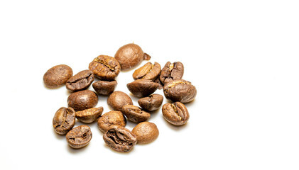heap of Roasted coffee beans isolated on white background. macro photo