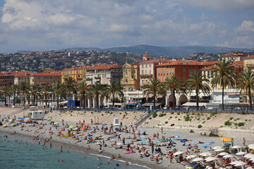 View of the Promenade des Anglais and the beaches of Nice at the height of the tourist season in August