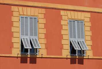 Fototapeta na wymiar Typical facades and windows of Nice, south of France