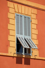 Fototapeta na wymiar Typical facades and windows of Nice, south of France