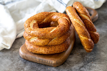 Sesame bagel. Turkish bagel on dark background. Bakery products. close up