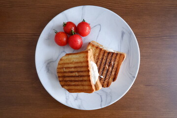 breakfast, toast and tomatoes. Top view photo with selected focus.