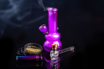 Glass bong with mj weed smoke and glass pipe with lighter. Light drug smoking concept. - obrazy, fototapety, plakaty