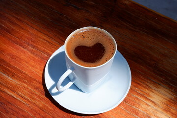foamy turkish coffee , turkish coffee in the cup . view from above.