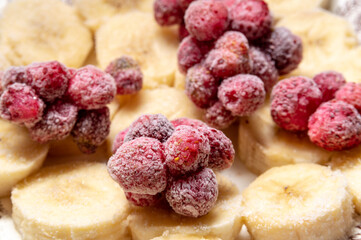 close-up of frozen strawberries and chopped frozen bananas