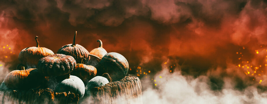 Halloween banner background concept,Jack o lantern pumpkin piles and fire smoke panoramic with copy space.