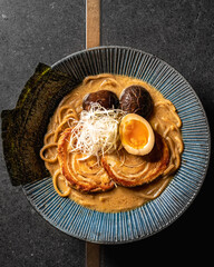 Tonkotsu Ramen
Rich Pork Broth, Slow-cooked Pork Belly, Soft-boiled Egg, Shiitake Mushroom, Leek, Nori