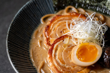 Tonkotsu Ramen
Rich Pork Broth, Slow-cooked Pork Belly, Soft-boiled Egg, Shiitake Mushroom, Leek,...