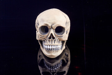 Humans skull mockup close-up isolated on black background. Death or horror concept.