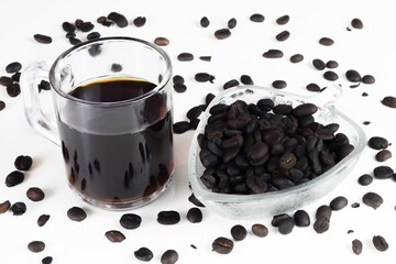 international coffee day, traditional colombian drink, closeup of glass of coffee and roasted...