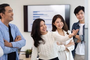 Business people working and brainstorming in office