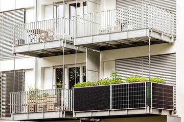 Solar panels on Balcony of  Building. Modern Balcony Apartment with Solar panel. - obrazy, fototapety, plakaty