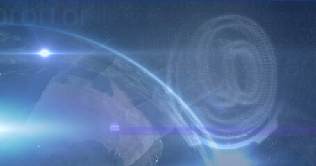 Image of light spots over globe and at symbol