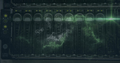 Image of moving shapes over server room