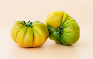 Two yellowish-green tomatoes of a local variety
