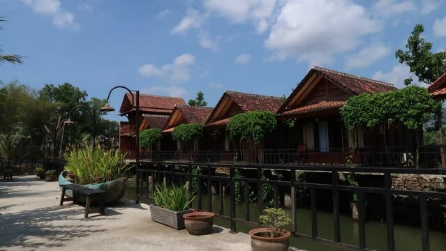 Beautiful house with green garden and pond in rural area of pacitan Central Java, Indonesia