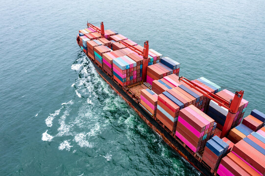 container vessels business and industry service export and import cargo by marine container vessels to distributing goods to consumers and supplier asia pacific and worldwide, aerial view