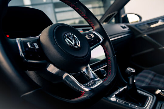 Volkswagen Golf GTI Mk7 interior and steering wheel. Kyiv, Ukraine - August 2022.
