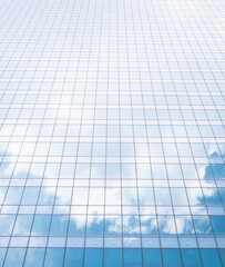 Obraz premium Glass wall architecture building reflection cloud and sky background.concept for modern office