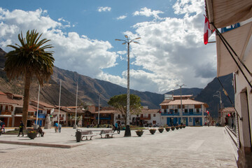Main square with a view of the mountains and an incredible sky, in the city of Pisac, Peru. 