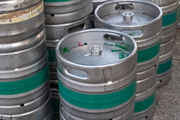 metal beer barrels with beer. Tin containers for storing alcoholic beverages for bars and...