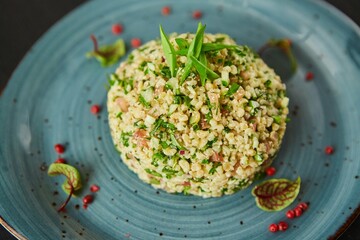 Classic risotto with herbs. Food from the chef in a restaurant or cafe.