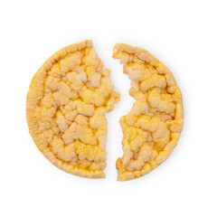 Crunchy corn cake broken in two on white background. Healthy snack