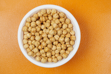 indonesia peanuts in a bowl on table top down .