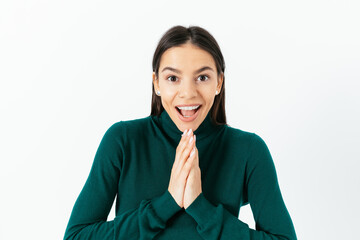Portrait of young woman clasped her hands