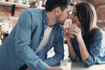 Staying Young at Heart: Middle-Aged Couple Having Fun at Home