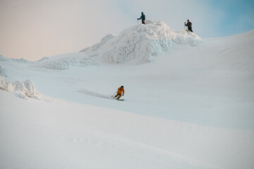 beautiful view of winter mountain slope along which the skier riding down.