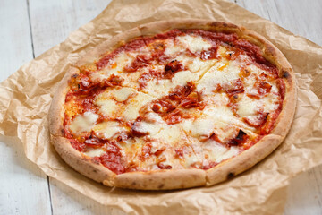 Satisfy Your Cravings: Mouthwatering Pizza Slices on Rustic Wood