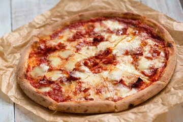 Satisfy Your Cravings: Mouthwatering Pizza Slices on Rustic Wood