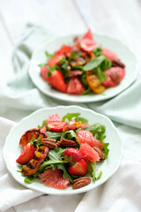 Fresh tasty salad on white background