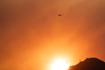 Helicopter sunset in the mountains