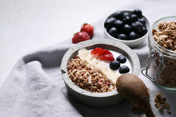 Healthy breakfast set on grey background. The concept of delicious and healthy food.