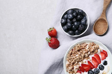 Healthy breakfast set on grey background. The concept of delicious and healthy food.