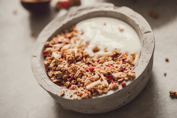 Healthy breakfast set on grey background. The concept of delicious and healthy food.