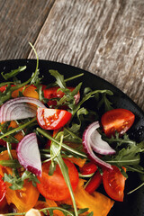 Savor the Flavor: Smoked Chicken and Salad on a Dark Wooden Background, a Perfectly Delicious Combination