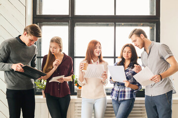 Young business people working together in the modern office