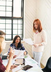 Young business people working together in the modern office