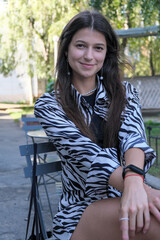 Young tall girl with long straight hair