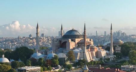 Istanbul, Turkey. Sultanahmet area with the Blue Mosque and the Hagia Sophia with a Golden Horn and Bosphorus bridge in the background at sunrise. - Powered by Adobe