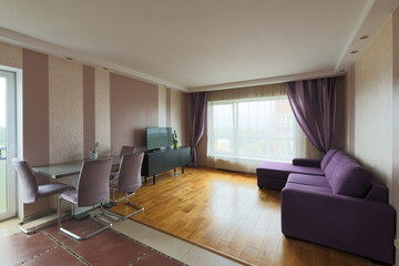 interior view of a purple style design apartment living room