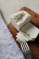 Sliced Feta cheese with herbs
