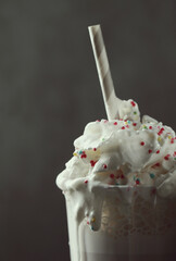 AI Generated Prompt

two glasses of hot chocolate with whipped cream and sprinkles, milkshake, drink milkshakes together, whipped cream, whipped cream on top, vanilla smoothie explosion, hot cocoa dri